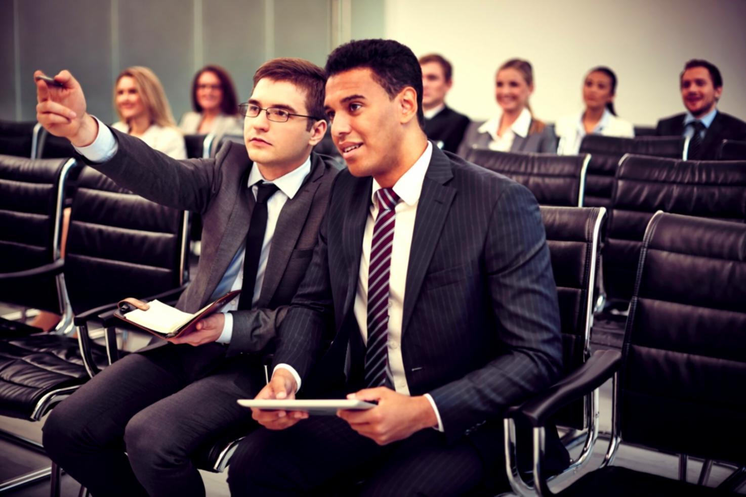 Modern office environment with financial analysts collaborating on budget analysis